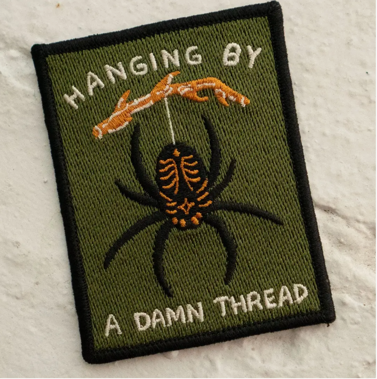 Hanging By A Thread Felt Sticky Patch
